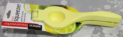 Amco Houseworks yellow and green squeezer juicer