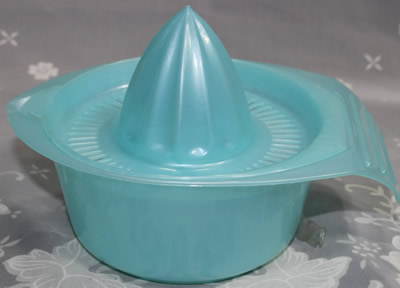 Translucent pale blue Made in Thailand plastic juicer