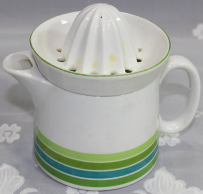 Shades of green bands on white juicer
