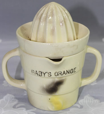 Yellow chick on a BABY'S ORANGE juicer