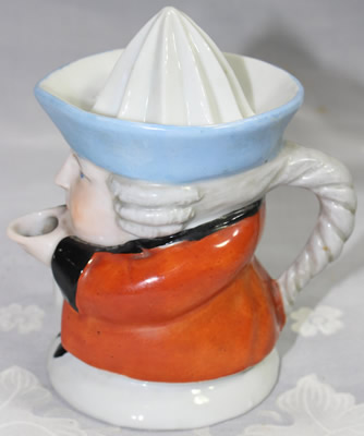 Orange with blue hat black collar1 piece toby juicer