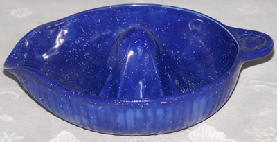 Blue speckled with white glass juicer