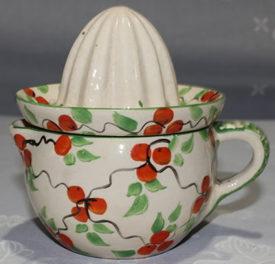 Sylvan Ware 2 piece juicer  with small oranges pattern