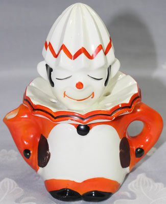 Goebel orange and white clown juicer with black highlights