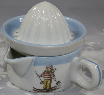Limoges white and blue juicer with skier