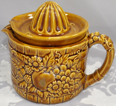 Fruit on brown jug juicer