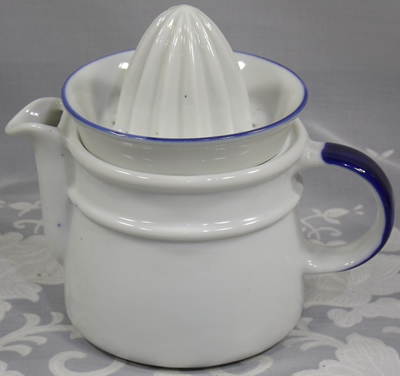 White 'teapot' with blue trim juicer