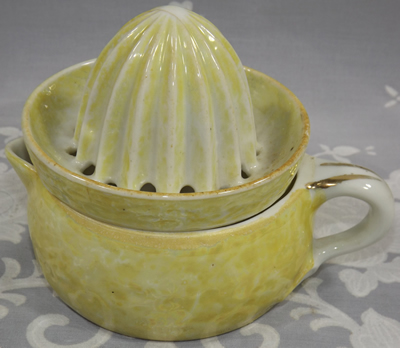 Orange peel lustre juicer with white and gold handle