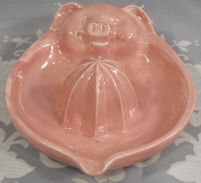 Pink saucer pig juicer