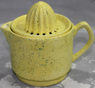 Speckled yellow 2 piece ceramic jug juicer with rivets