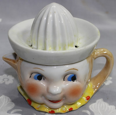 Small lustre smiley face juicer 