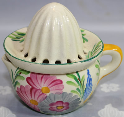 Cottage garden flowers on a 2 piece ceramic juicer