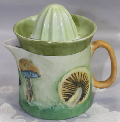 Mushrooms hand painted on a ceramic 2 piece juicer