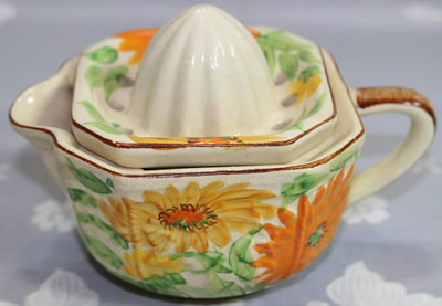 Sylvan Ware juicer with yellow and orange flowers juicer