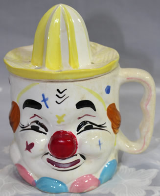 A pink and blue base collar clown juicer