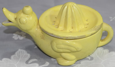 Painted yellow duck juicer