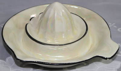 Black trim on patterned white Czecho-Slovakia juicer