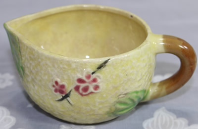 Cream with maroon flowers juicer jug
