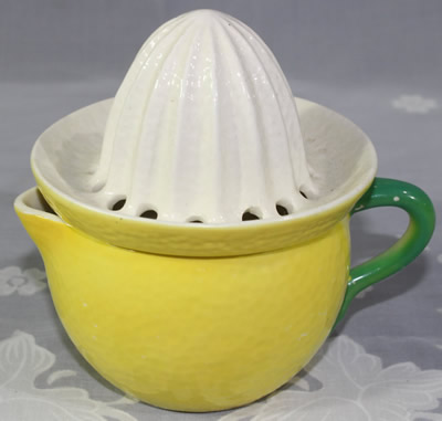 Yellow orange peel texture with white reamer juicer