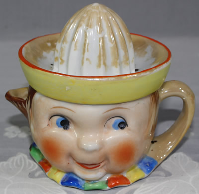 Multicoloured collar lustre smiley face juicer