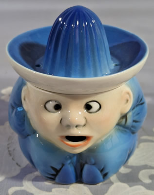 Flesh colour and blue child juicer