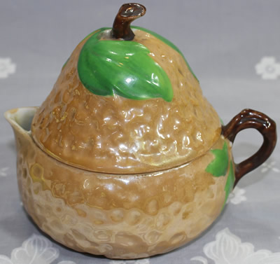 Light brown lustre pear shape ceramic juicer