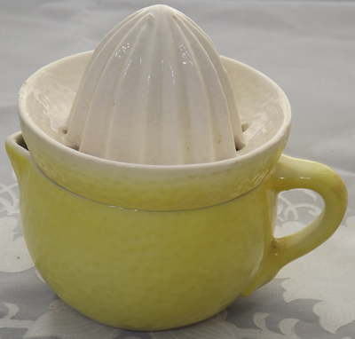 Yellow 'peel' and white juicer