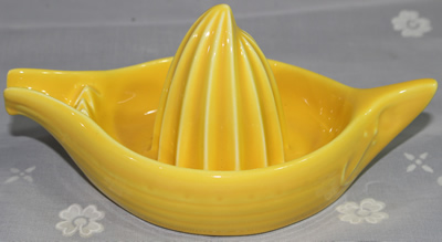 Plain yellow Beswick boat juicer