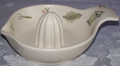 White with bird house etc. Pfaltzgraff juicer