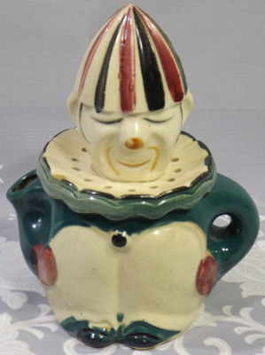 Dark green and maroon 5⅝" clown juicer