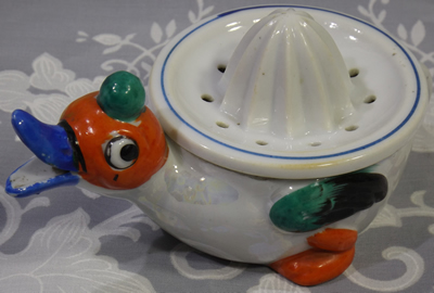 Red head, blue bill duck juicer