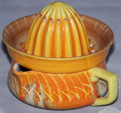 Shelley orange bands drip glaze juicer