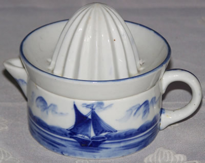 Boat 'type 2' and small boat on 2 piece blue & white juicer
