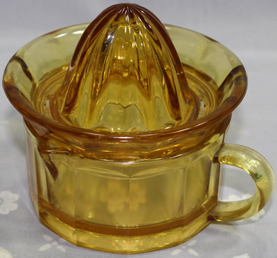 Amber glass 2 piece juicer with offset loop handle