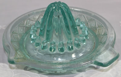 Diamond pattern aqua blue green glass saucer juicer
