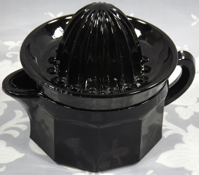 Black glass Edna Barnes 2 piece reproduction juicer