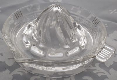 Hazel Atlas 'crisscross' saucer shape clear glass juicer