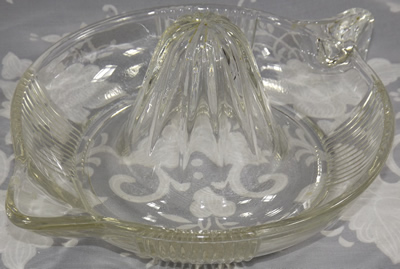Tear drop handle ribbed glass juicer