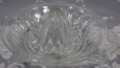 Heart on tab handle clear glass juicer