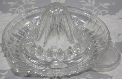 Speckle tab handle saucer clear glass juicer