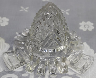 An embossed C. H. Read clear glass 'Juice Extractor'