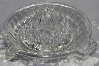 A 29 convex panel clear glass offset tab handle juicer