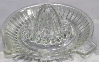 A 44 convex panel clear glass offset tab handle juicer