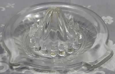 A 35 concave panel clear glass offset tab handle juicer