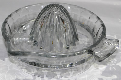 ORANGE JUICE EXTRACTOR clear glass juicer