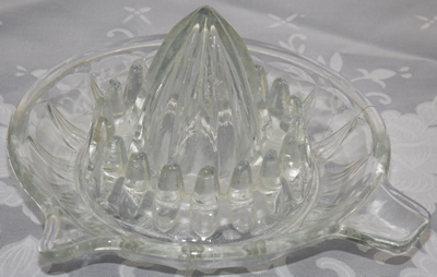 Embossed Rd DESIGN No 25239 clear glass saucer juicer