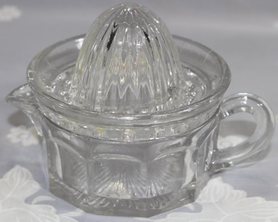 Westmoreland Specialty Co. clear glass 2 piece juicer
