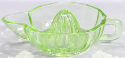 Small 14 panel green glass jug like juicer