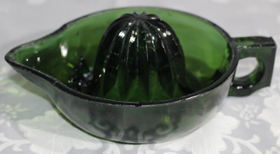 Square handle emerald green glass juicer