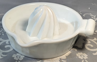 Clockwise spiral 1 piece white milk glass juicer